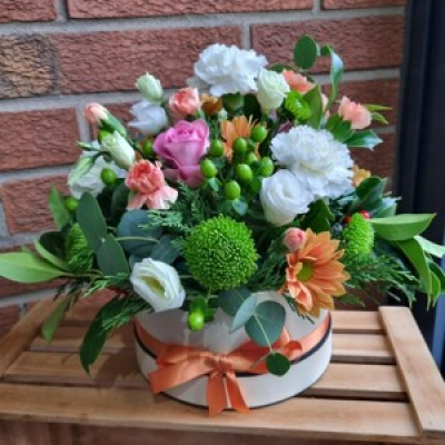 Hat box - Lovely display of flowers in hat box just needs water adding daily, once flowers have finished blooming you have a lovely box as a keepsake.