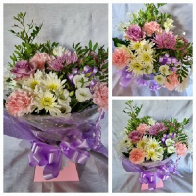 Flower box - Lovely fresh flowers presented in a box complete with bow, makes the ideal gift.