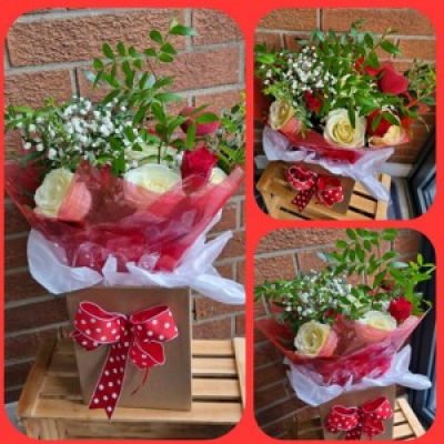 Gift box - Gift box of white and red roses with foilage, suitable for all occassions.