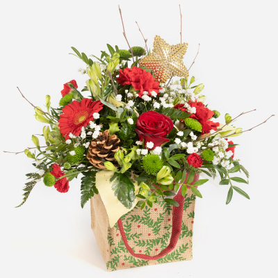 Jingle Bells - A selection of customer favourite flowers and foliage in a design that’s simply the perfect Christmas present.
